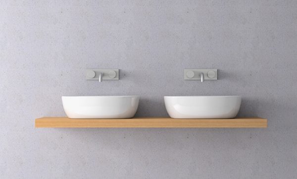 Betonwand mit minimalistischen Waschbecken